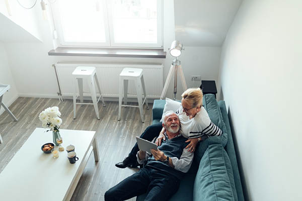 Happy couple in living room