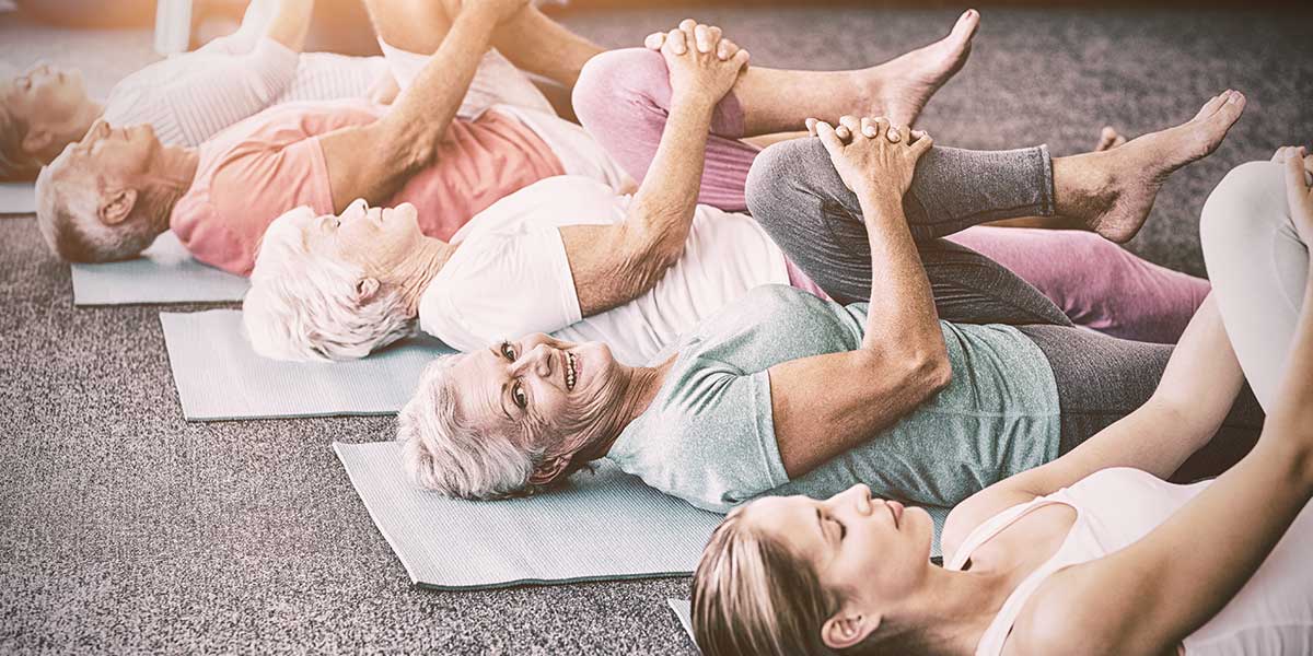 Seniors doing yoga